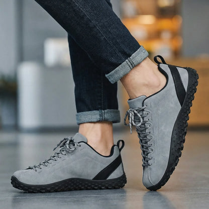 Unisex wide fit, barefoot feel, cushioned comfort trainers with suede upper and everyday walking