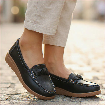 Women's wide fit, arch support, cushioned comfort loafers with slip on design and everyday walking